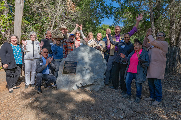 Pond Farm students and representatives from Stewards of the Coast and Redwoods, California State Parks, the National Park Service, and the Kashia Pomo celebrate the unveiling of the Pond Farm Pottery National Historic Landmark plaque on Oct. 26. Photo from California State Parks.